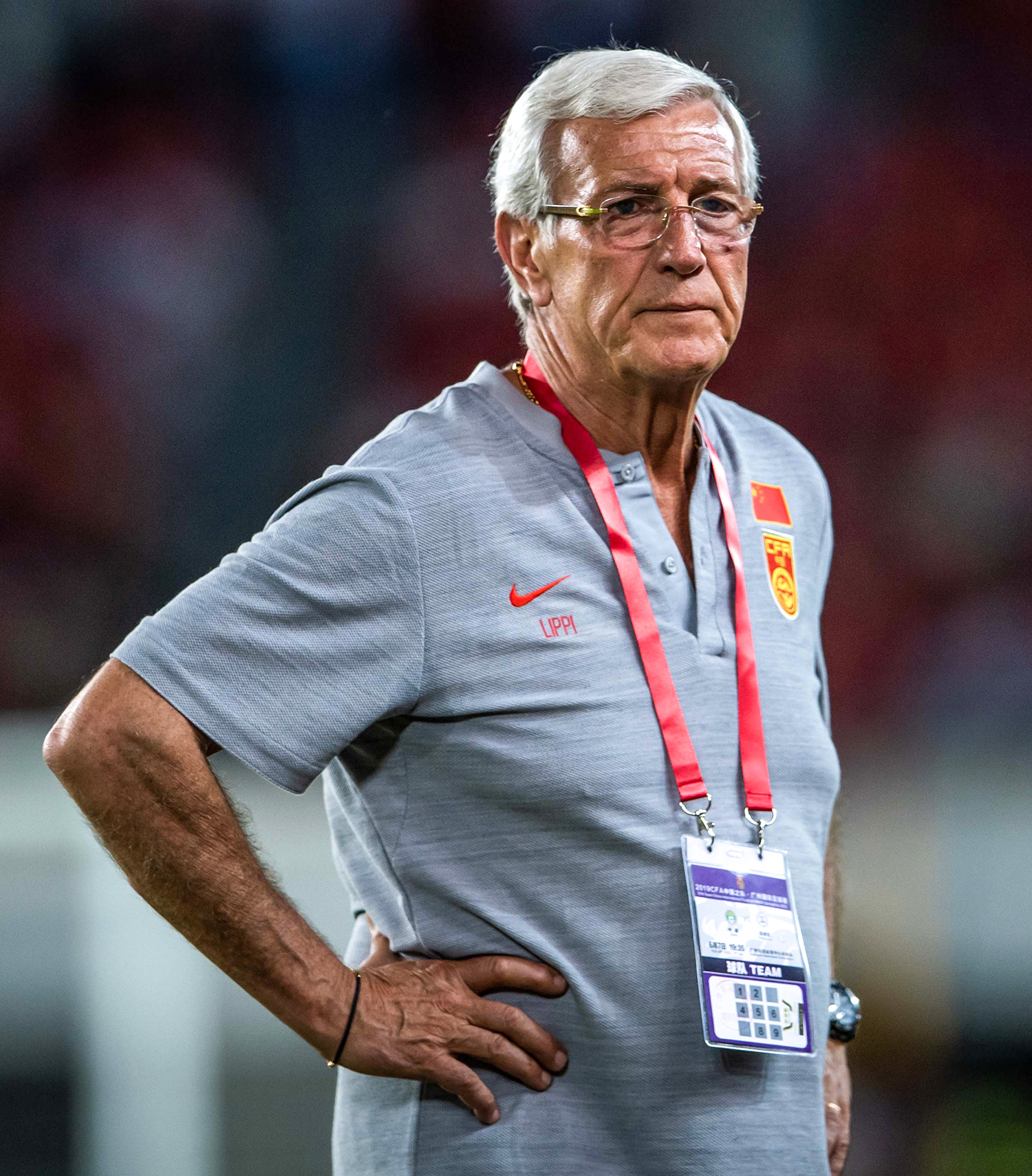 Marcello Lippi walks off the pitch after China’s 2-1 defeat to Syria, announcing his resignation as head coach during the Asian Qualifiers.