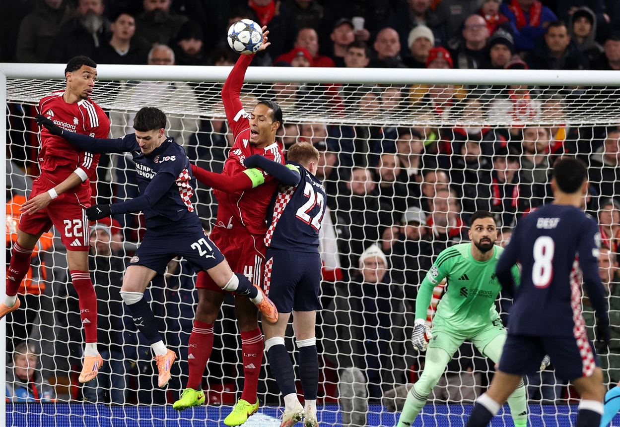 Virgil van Dijk gives away a penalty for handball during Liverpool's heavy 4-1 defeat by PSV Eindhoven in the Champions League on November 26, 2025.