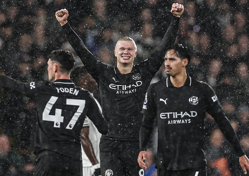 Erling Haaland celebrates after scoring his 100th Premier League goal in a 5-4 win at Fulham on December 2, 2025.