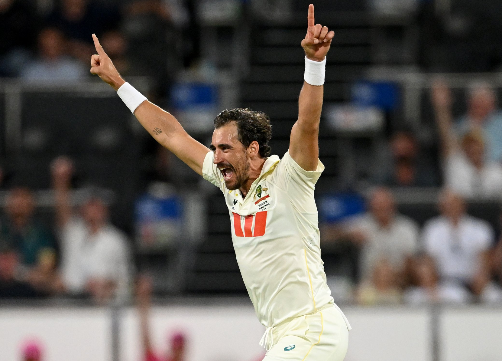 Mitchell Starc celebrates after claiming another wicket during the second Ashes Test in 2025.