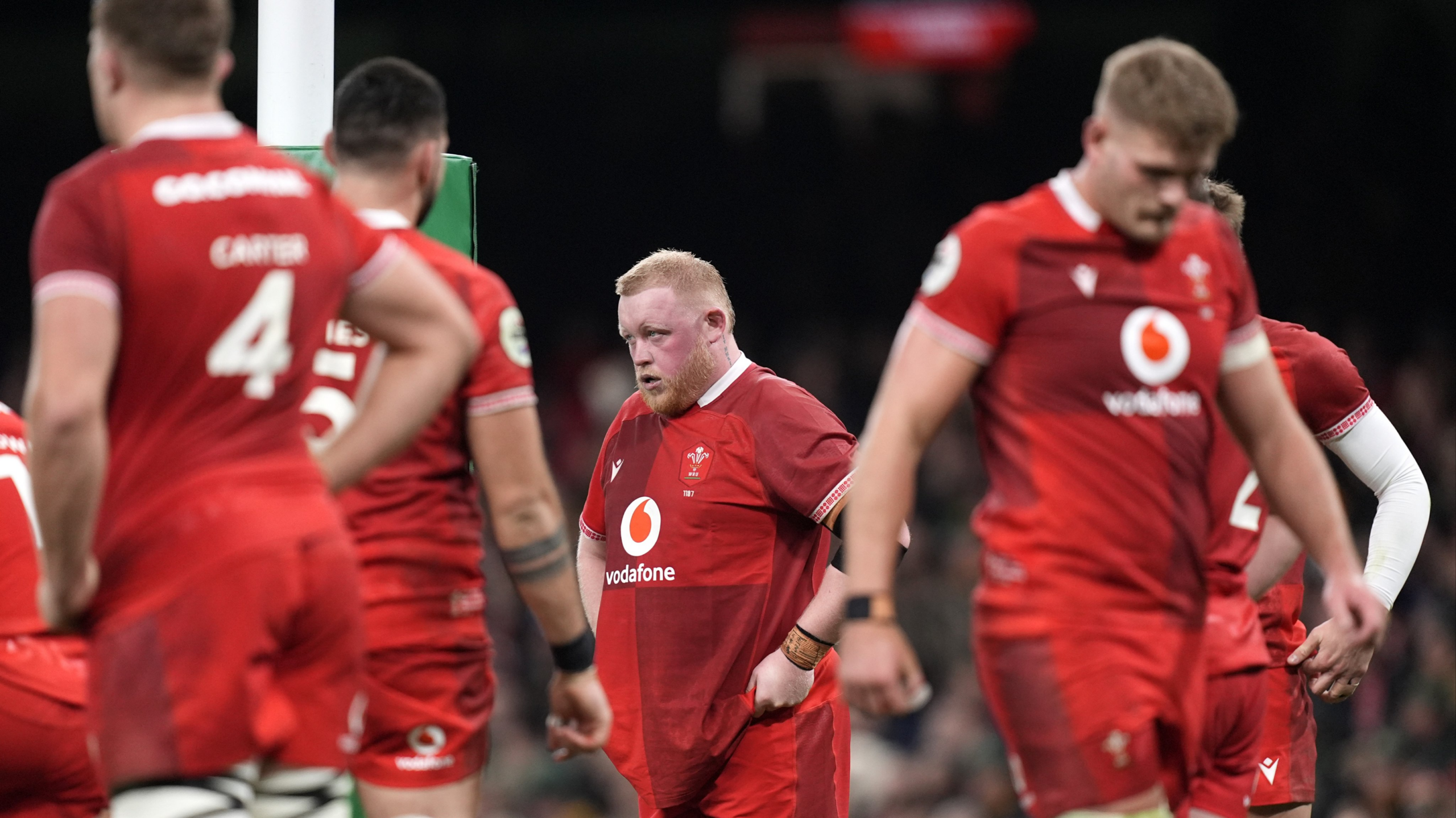 Wales players cut dejected figures after losing 73-0 to South Africa on November 29, 2025.