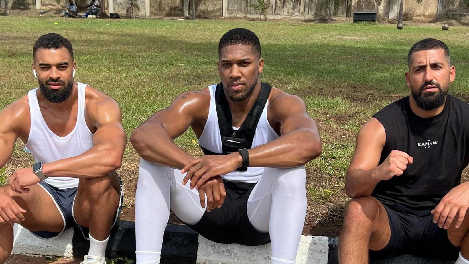 Anthony Joshua, Sina Ghama (right) and Latif Ayodele (left) in a photograph. The latter two died on December 29, 2025 following a fatal crash in Nigeria.
