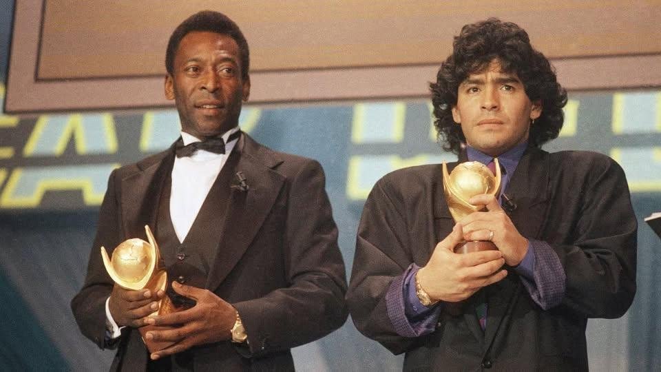 Diego Maradona and Pelé pictured together, two football legends often compared in the debate over the greatest player of all time.